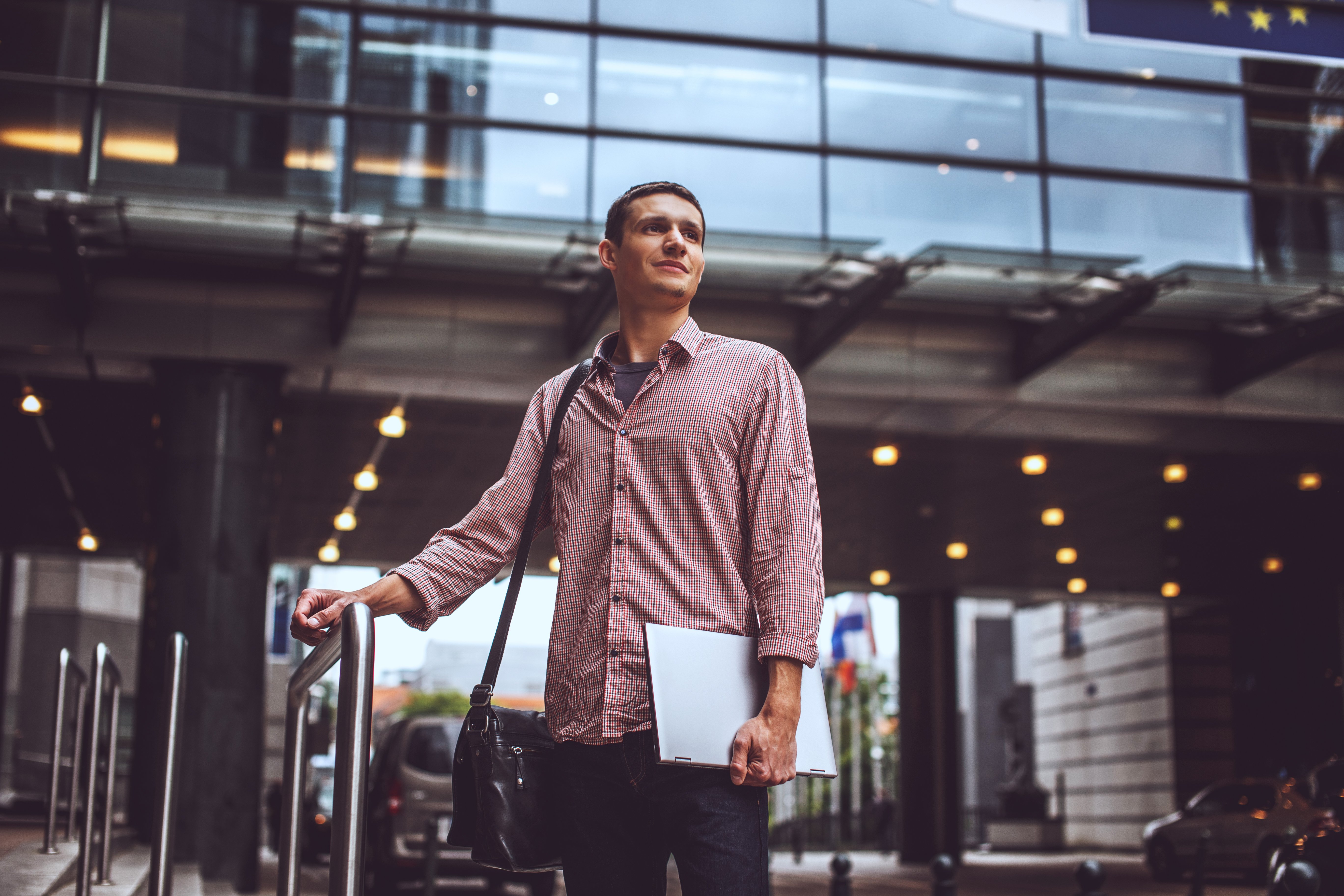 guy-modern-street-casual-clothing-with-laptop